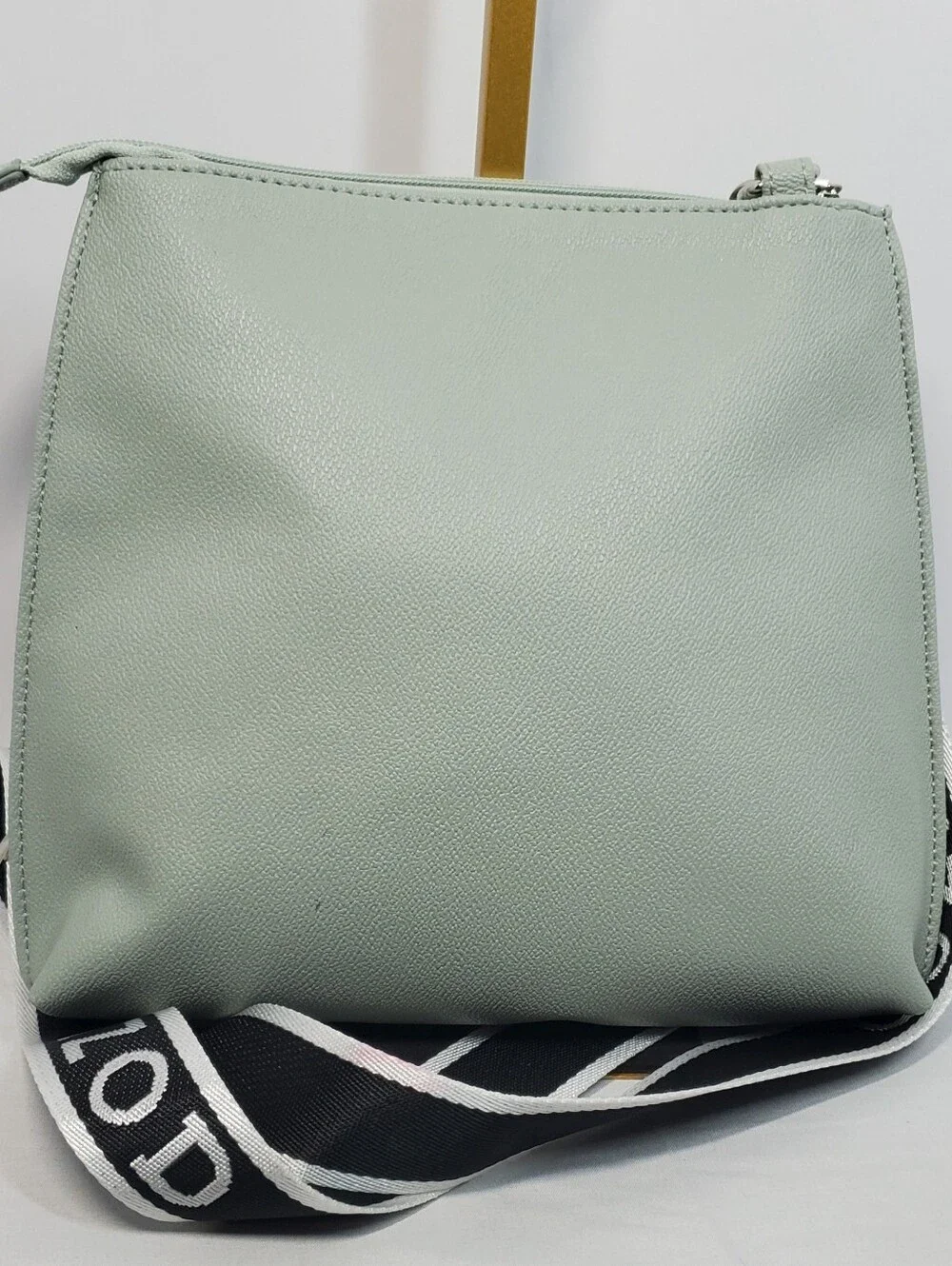 IZOD Mint Green Crossbody Bag with Black-and-White Branded Detachable Strap